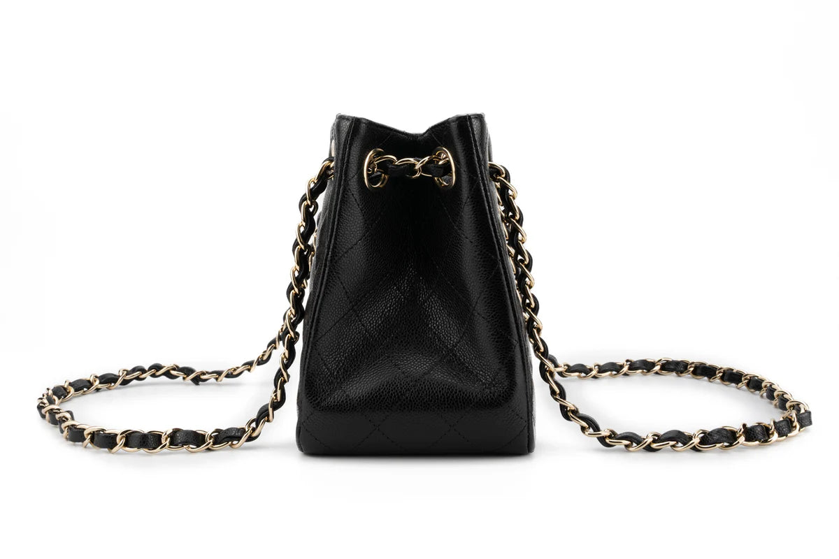 Chanel Drawstring Bag Caviar Black Champagne