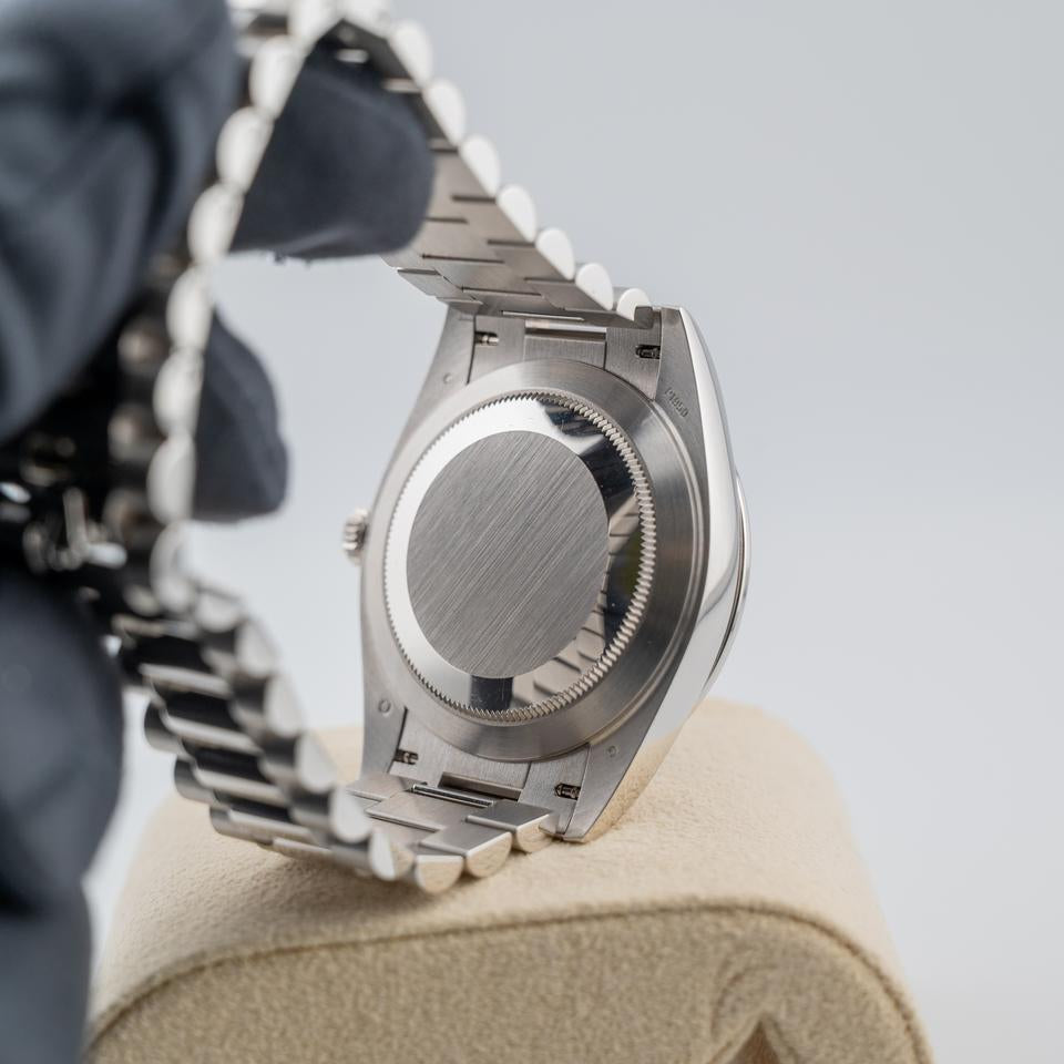 Rolex Day-Date 40
Platinum Olive Green Arabic Dial Diamond Bezel